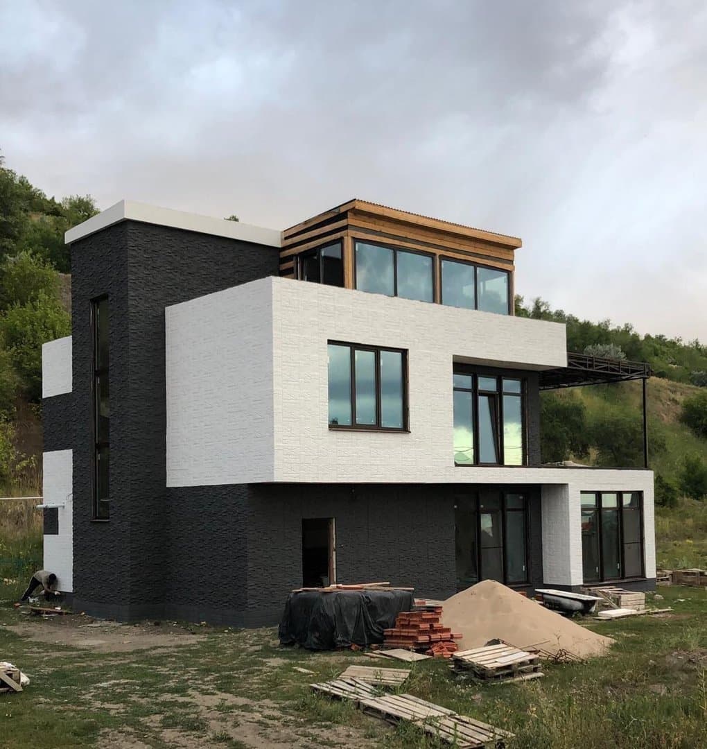 Двухэтажный коттедж с эксплуатируемой кровлей